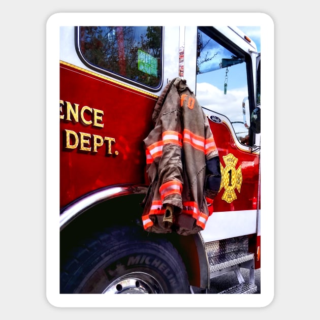 Firemen - Fireman's Jacket On Fire Truck Sticker by SusanSavad